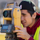 University of South Carolina international student Shilpkumar from India looks through a surveyor lens at his civil engineering job