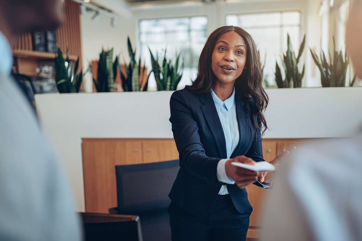 Professional woman sitting down in a meeting