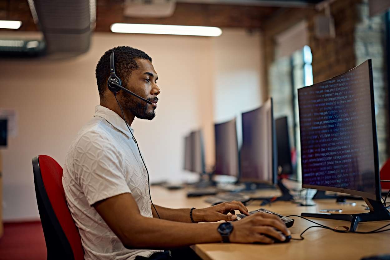 Man works at a computer