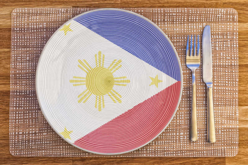 The Filipino flag on a plate with knife and fork