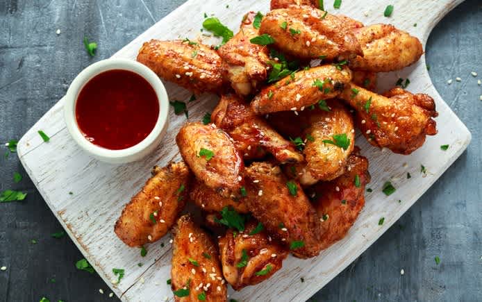 Gooey and glazed chicken wings. Source: Shutterstock \[…\]

[Read More…](https://quisine.quandoo.co.uk/guide/eat-chicken-wings-london/attachment/chicken-wings-article/)
