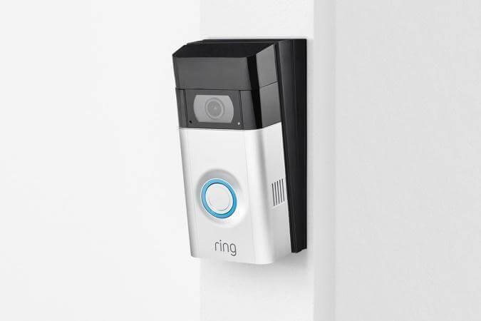 Ring Video Doorbell 2 mounted with wedge kit to adjust angle for better motion detection and view.