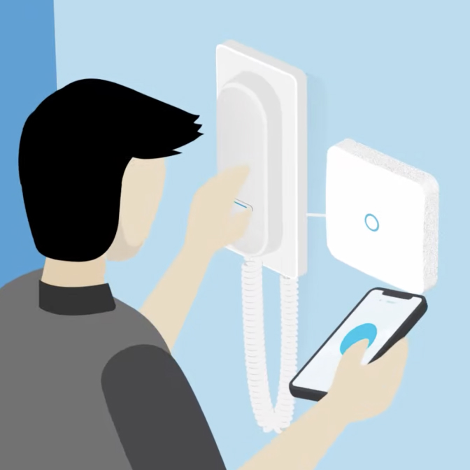 User installs Ring Intercom on indoor handset using app instructions, a screwdriver, and included mounting gear.