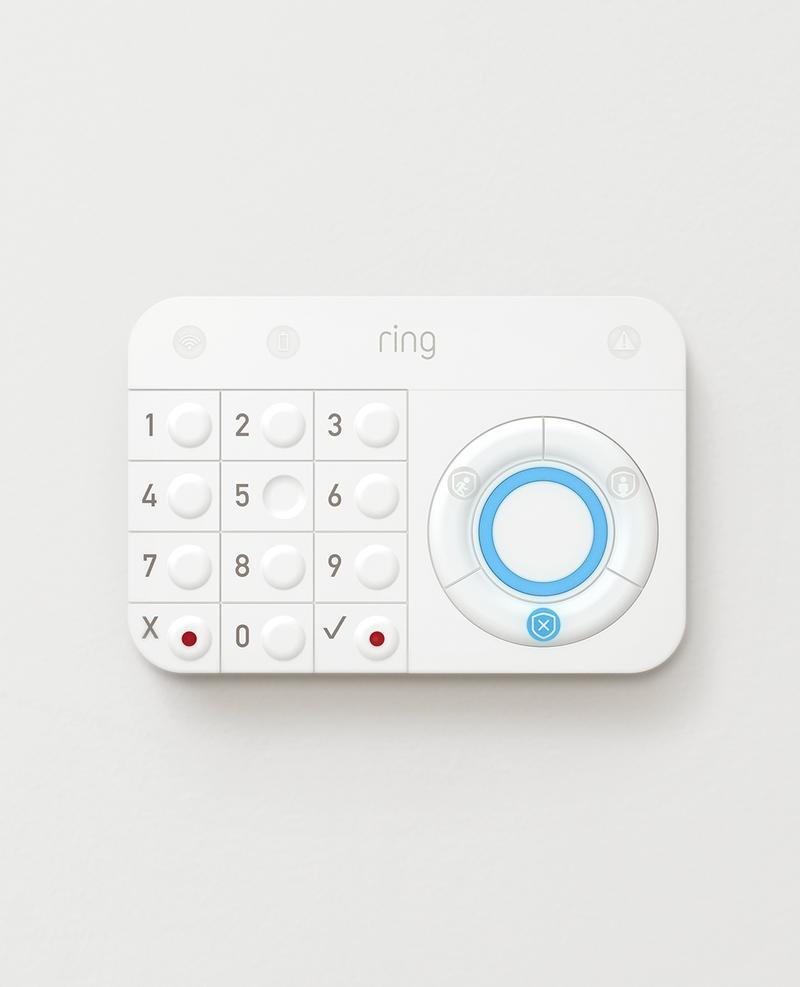 Ring alarm Keypad with number pad and mode selection buttons mounted on a white indoor wall.