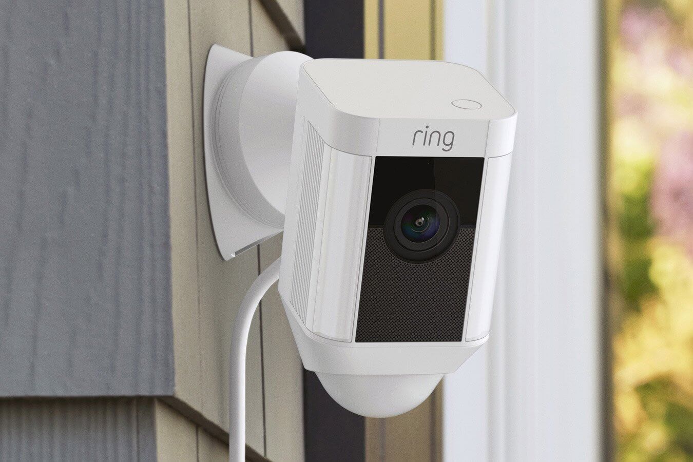Ring Spotlight Cam Wired mounted with adjustable wall mount for improved motion detection and viewing angle.