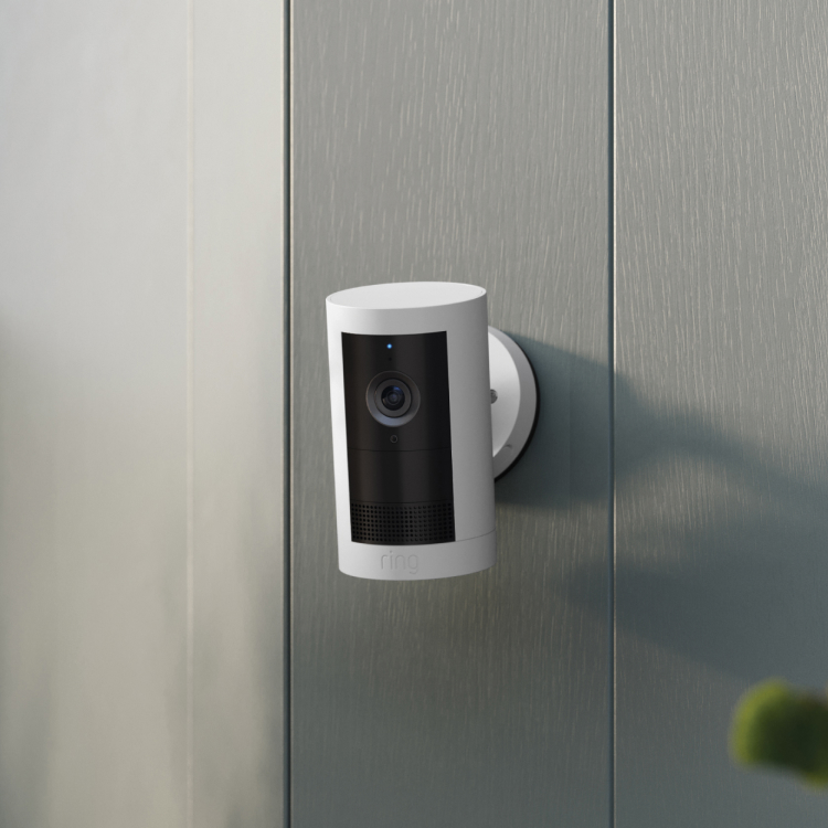 Ring Outdoor Camera Plus mounted on wall, featuring 2K image quality for advanced home security monitoring.