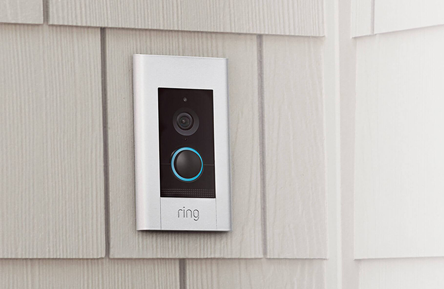 Ring Video Doorbell Elite securely flush-mounted on a textured home siding.