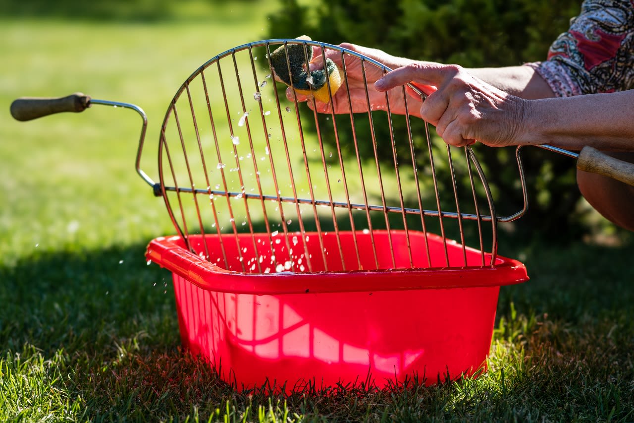 Maak je BBQ goed schoon na afloop. Foto: Adobe Stock / Christian