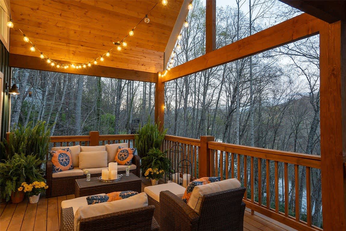 The porch of the Aaronson home in Cashiers on Lake Glenville.