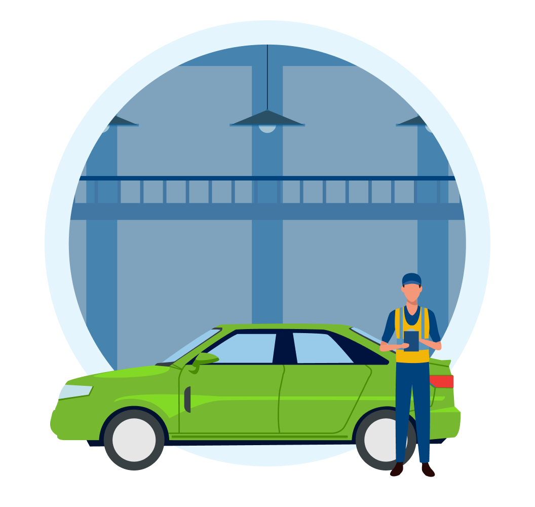 Meccanico accanto a un’auto verde in un’officina. Meccanico accanto a un’auto verde in un’officina.