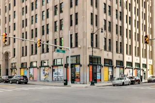A street-level photo of The Press/321 ground floor retail.