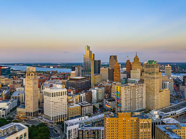 An aerial photograph of the Downtown Detroit skyline.