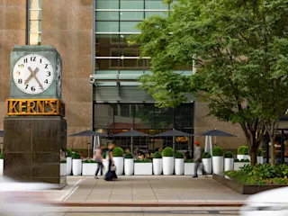 Exterior photograph of the Adelina patio area at One Campus Martius.
