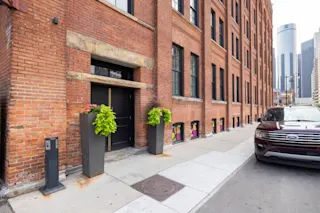 An exterior, street-level photo of the ground-floor level at The Globe, highlighting the retail opportunities.