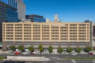 An exterior photograph of One Campus Martius Garage retail spaces.