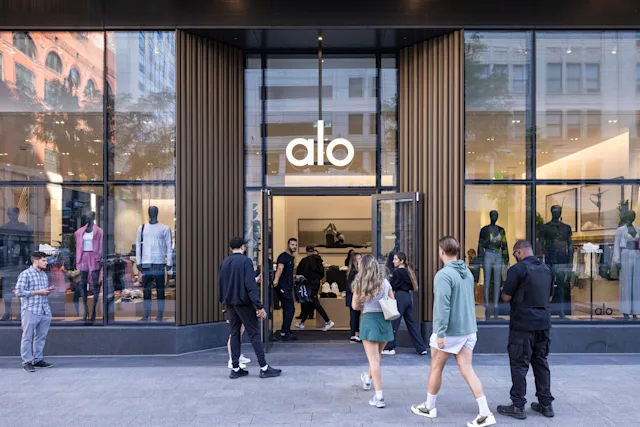 An exterior photograph of the Alo grand opening at Hudson's Detroit, featuring activation.