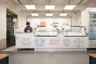 A photo of the counter at Milk & Froth inside the Buhl Building.