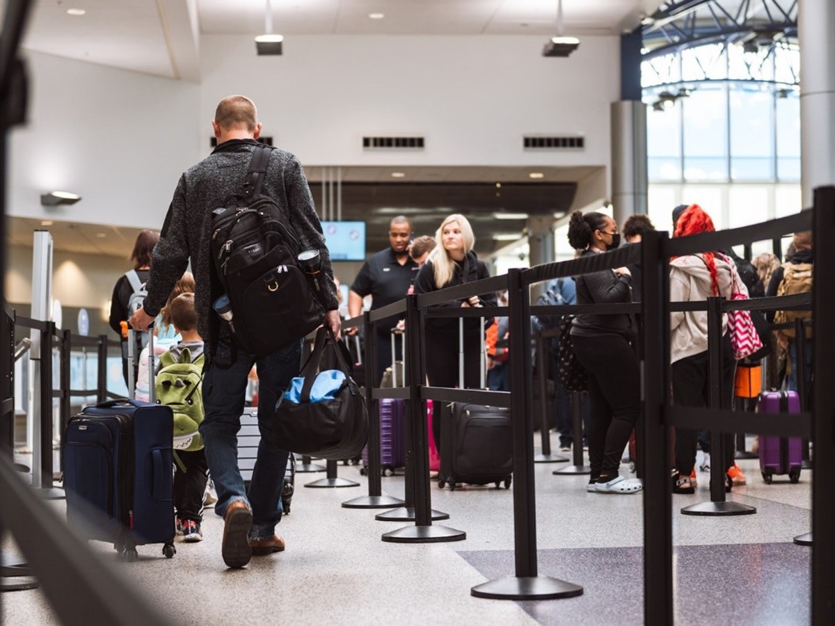 A photo of a family in the TSA line at CVG Airport.