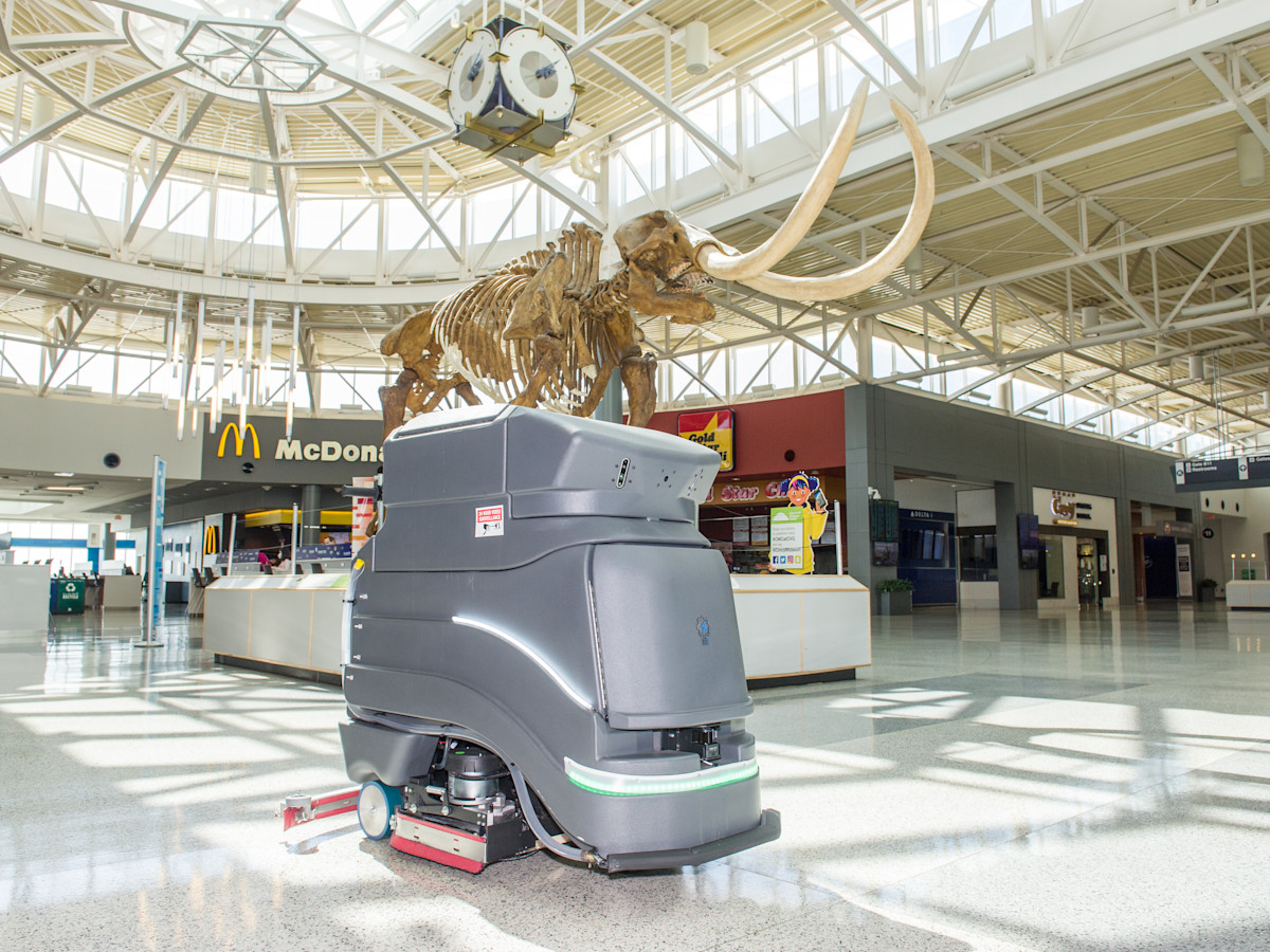 A photo of our Avidbot robot that cleans floors in CVG Airport.