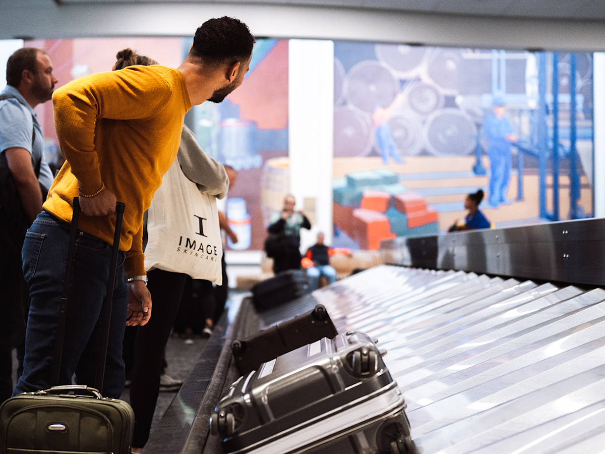 A photo of a man baggage claim