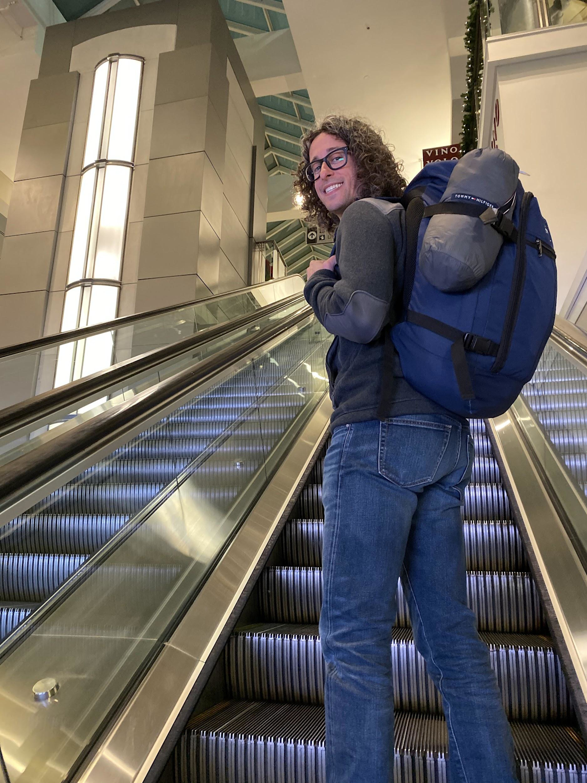 Jay Kruz Going Up Escalator