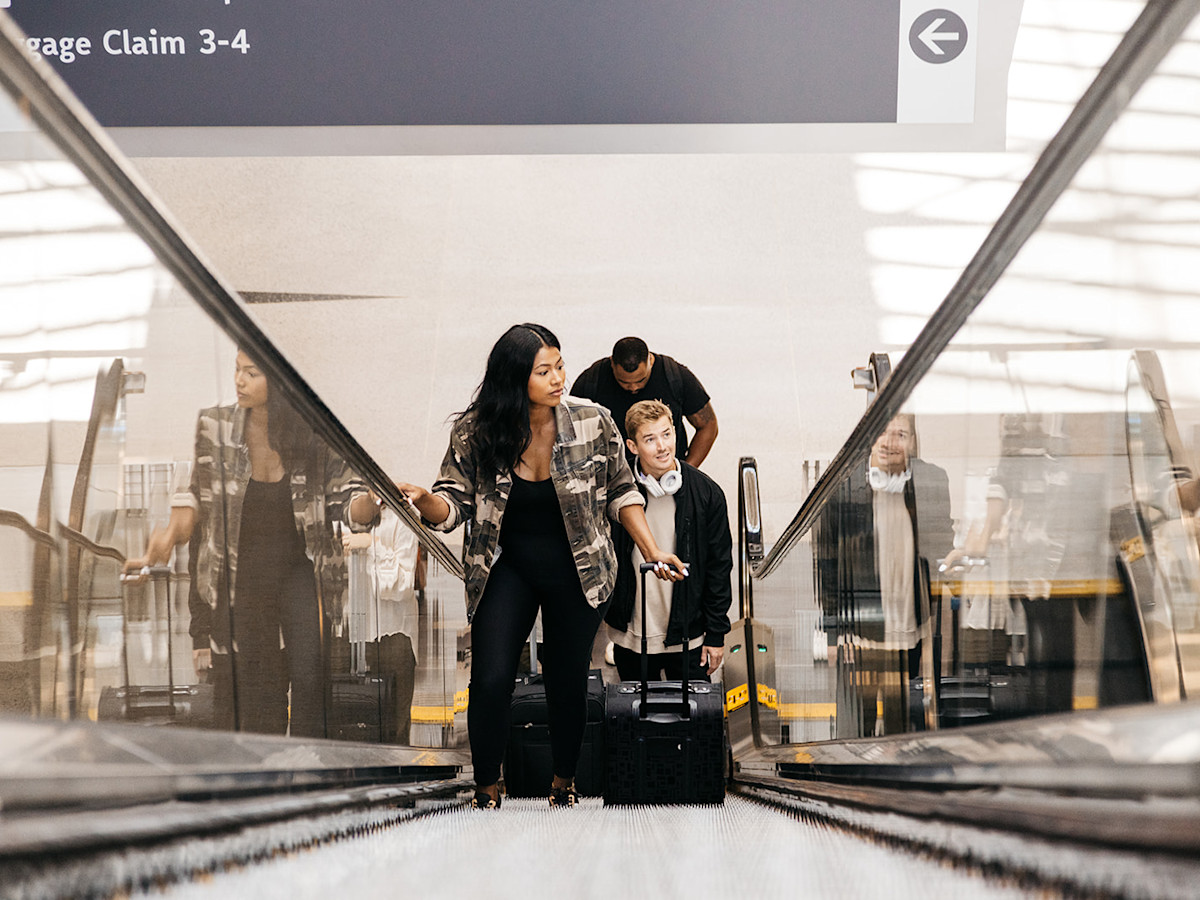 Passengers on escalators