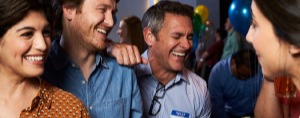People at an event laughing