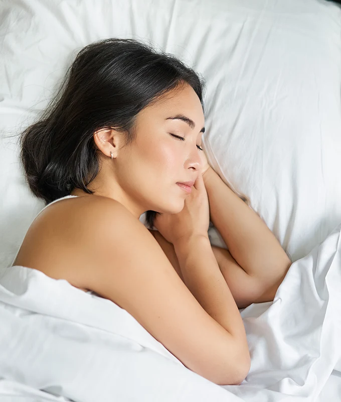 Woman sleeping peacefully alone