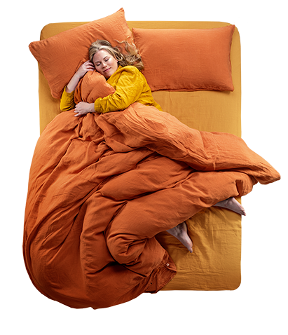 Top down view of a women laying on a Silentnight Memory foam bed.