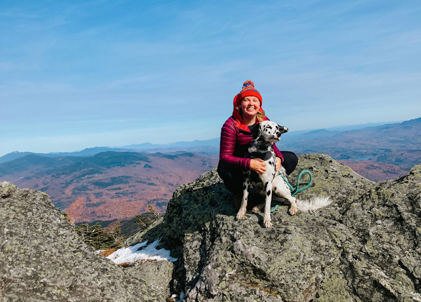 Author Kirsten hiking with her dog, Theo!
