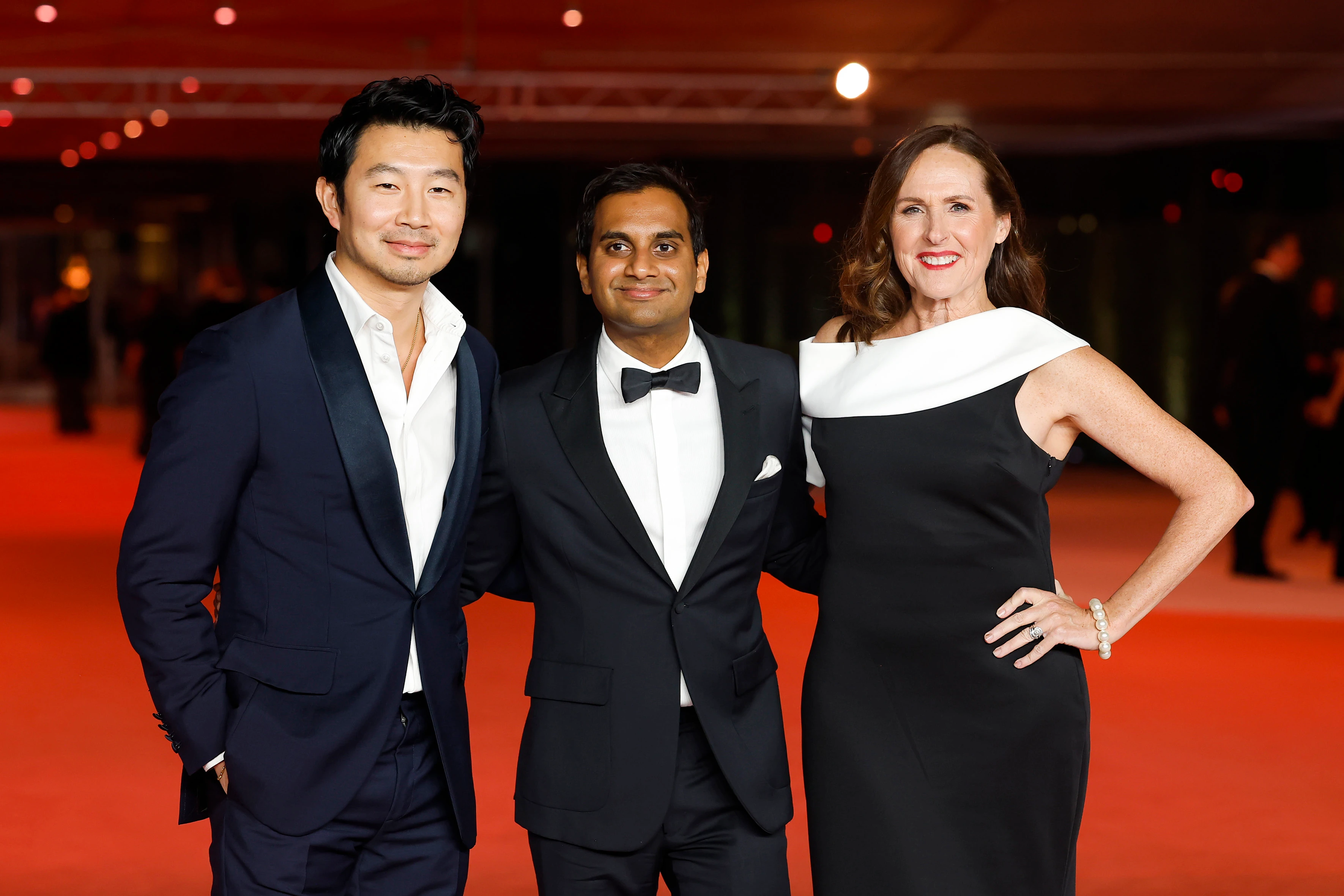 Simu Liu, Aziz Ansari and Molly Shannon