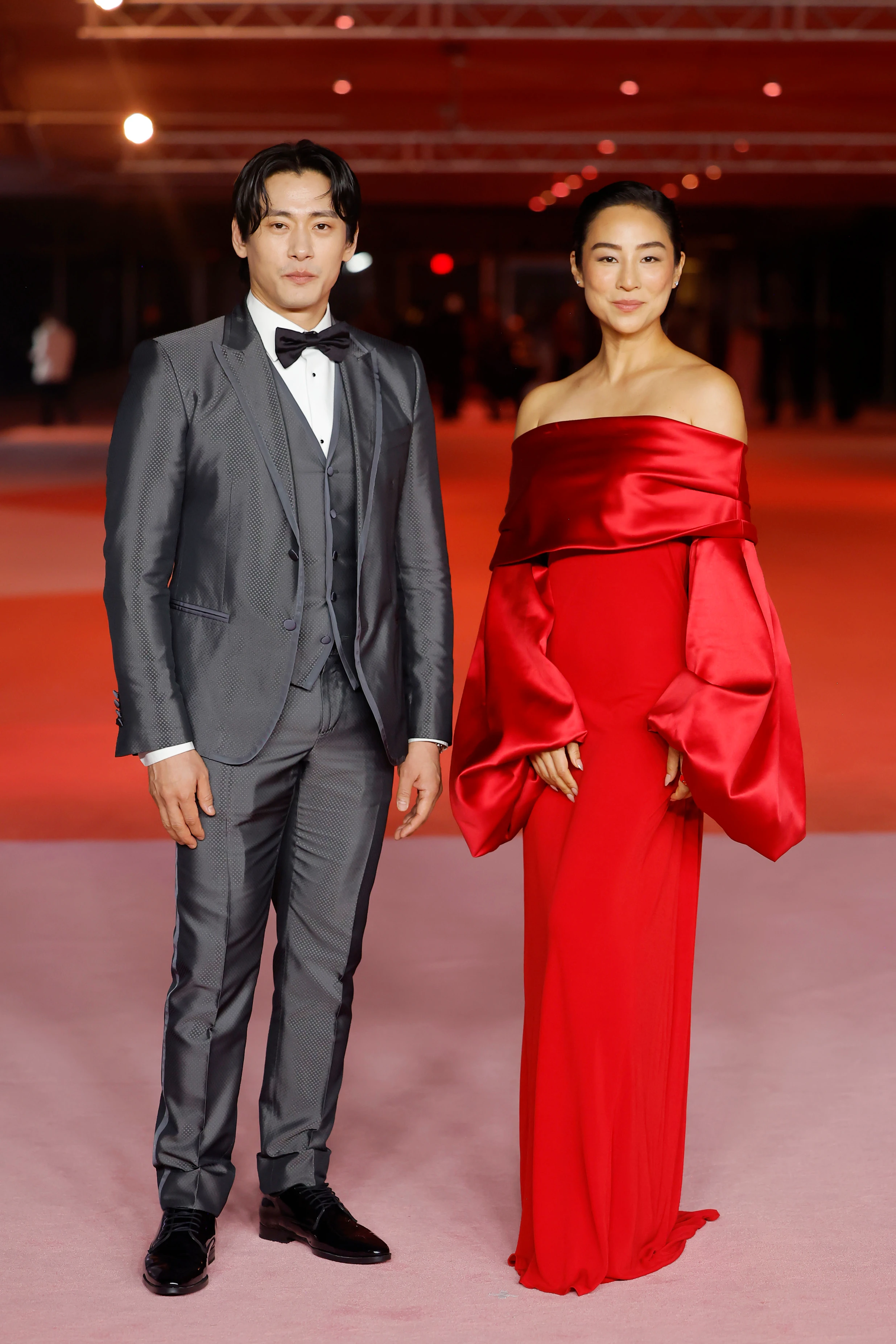 Teo Yoo and Greta Lee