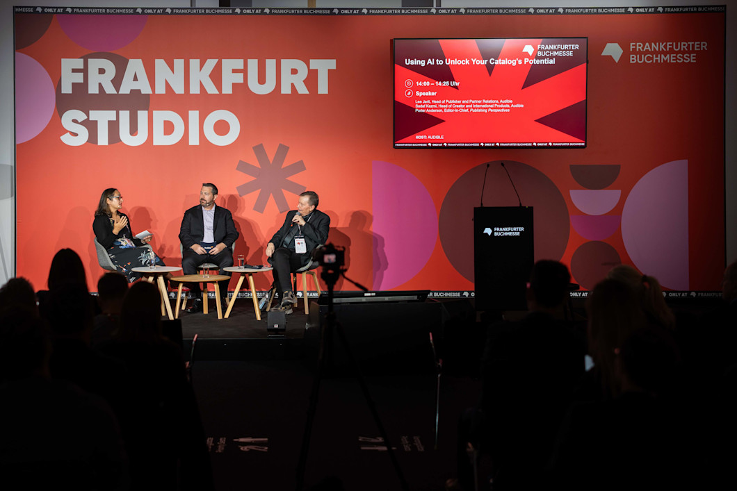 A photo of Audible's Sadaf Kazmi and Lee Jarit in conversation at Frankfurt Book Fair 2025.
