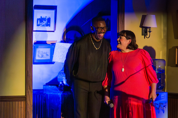 A photo of Kate Navin and Colman Domingo together onstage at the fifth anniversary celebration for Audible Theater.