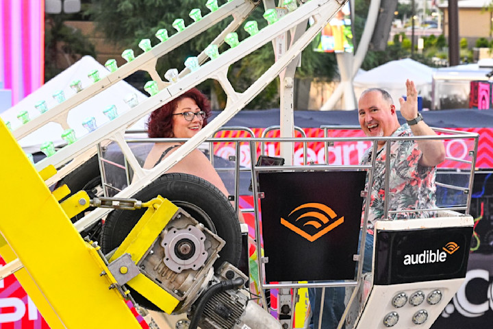 Riders on Audible’s Ferris “Wheel of Love” were immersed in romantic listens. Photo: Brenton Ho for iHeartRadio.