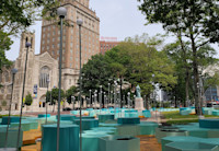 Blue hexagon seats, tables and planters and solar lights in Washington Park in Newark.