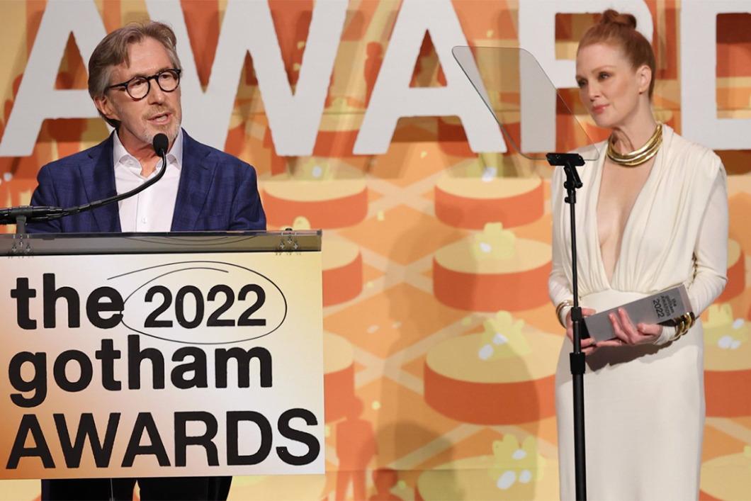 Don Katz and Julianne Moore stand side by side onstage as Katz receives the Gotham Awards Innovator Tribute award in 2022.
