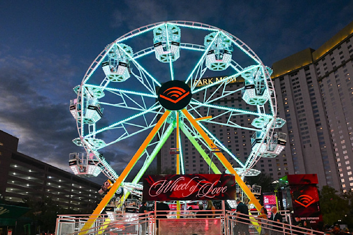 Audible’s Ferris “Wheel of Love” lit up the Las Vegas night. Photo: Brenton Ho for iHeartRadio.