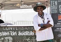 World renowned chef Marcus Samuelsson stands in front of the "Our Harlem" foodtruck.