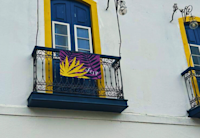 a balcony with a sign on it