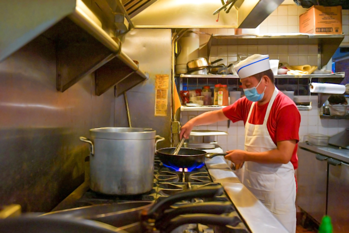 Cook in the kitchen.