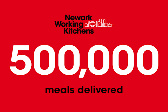 Against a red background, white text calls out 500,000 meals delivered below the Newark Working Kitchens logo.