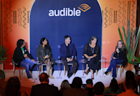 A photograph of a panel discussion from Audible's celebration that took place in Mexico.