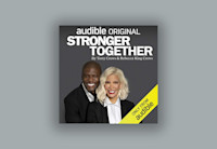 Set on a grey background, the cover art of "Stronger Together" showcases the authors Terry Crews and Rebecca King-Crews both in a black suit jackets and white shirts. The title "Stronger Together" is in large white text above their heads.