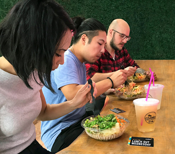 Three Audible employees eat at the counter of a local Newark restaurant for Lunch Out Wednesday.