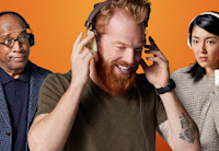 Three listeners with headphones on enjoying Audible.