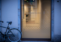 A bicycle is parked outside of the Audible studio in Berlin, Germany.