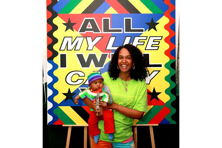 a person holding a baby