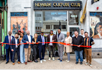 Local leaders, business owners, and Audible representatives at the ribbon-cutting for Newark Culture Club.