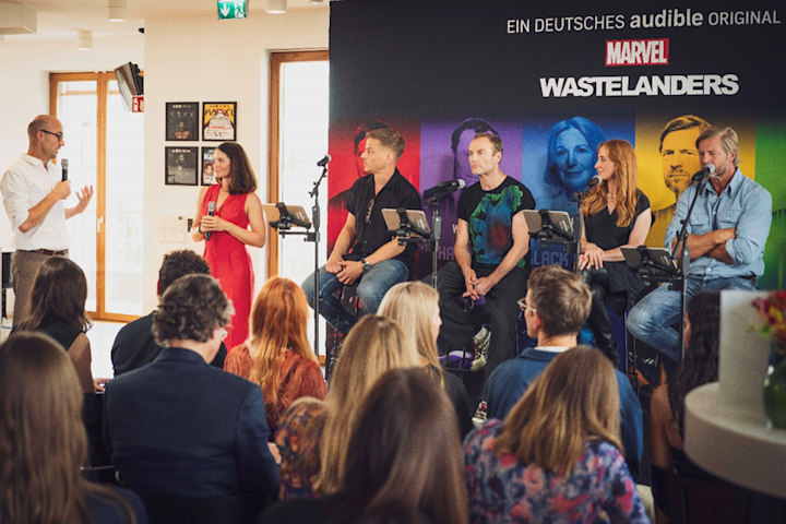 Oliver Daniel, Audible’s country manager for Germany, with the cast of Marvel’s Wastelanders at an event in Berlin this year.